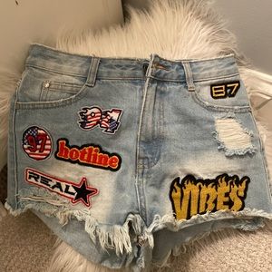 Misguided patch shorts